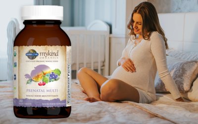 mykind organics prenatal multi bottle and pregnant woman