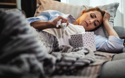 a woman sick with a cold
